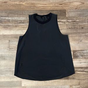 Women’s Athleta muscle tank with scalloped hem. Size large